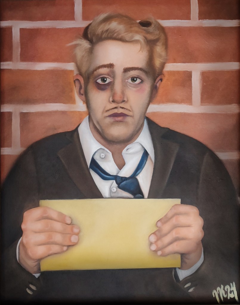 1920's or 1930's man getting his arrest photo taken. Brown suit. Brick wall. Black eye.